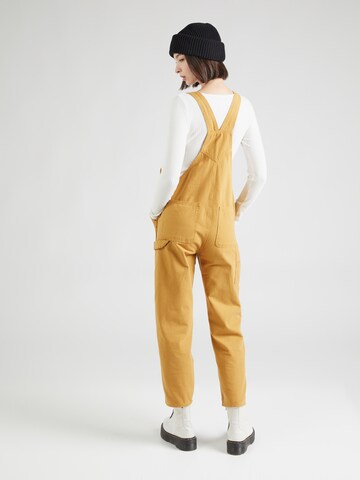 regular Pantaloni con pettorina 'GROUND WORK' di VANS in marrone