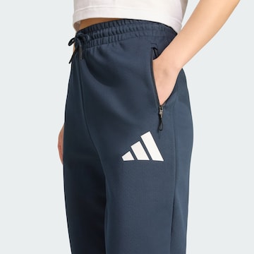 ADIDAS SPORTSWEAR - Tapered Calças de desporto 'Z.N.E.' em azul