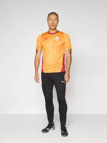 Maillot 'GSK' PUMA en orange