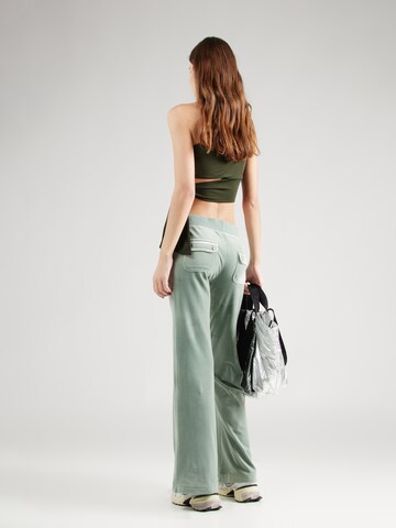 Juicy Couture Na zvonec Hlače 'LAYLA' | zelena barva