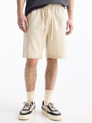 Pull&Bear Loose fit Trousers in Beige: front
