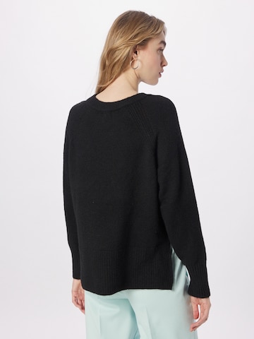 River Island - Jersey en negro