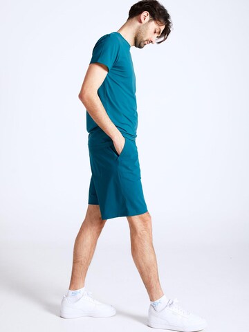 Regular Pantalon de sport 'Shorts' SPORTKIND en vert