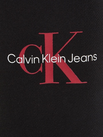 Calvin Klein Jeans Tapered Hose in Schwarz