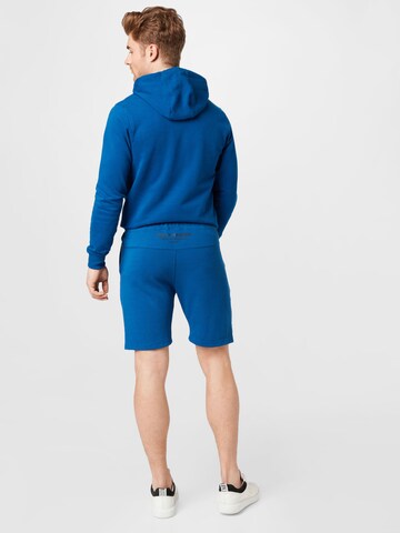 regular Pantaloni sportivi di HELLY HANSEN in blu