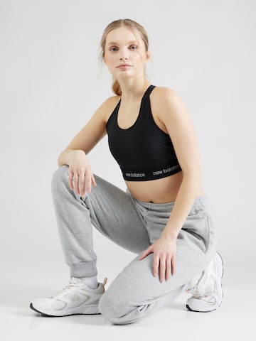 Bustino Reggiseno sportivo di new balance in nero