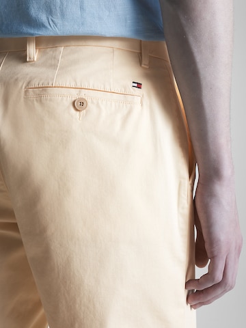 TOMMY HILFIGER Regular Chino trousers 'Harlem' in Yellow