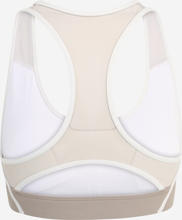 Reebok - Bustier Sujetador deportivo en beige