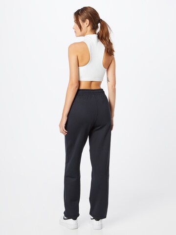 NIKE Loose fit Workout Pants in Black