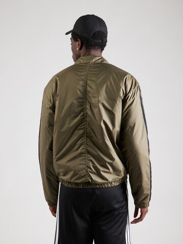ADIDAS SPORTSWEAR Αθλητικό μπουφάν 'Essentials' σε πράσινο
