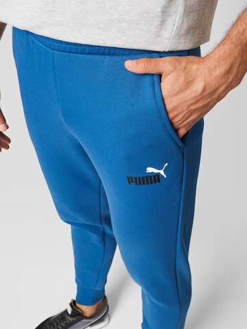 PUMA Tapered Workout Pants in Blue