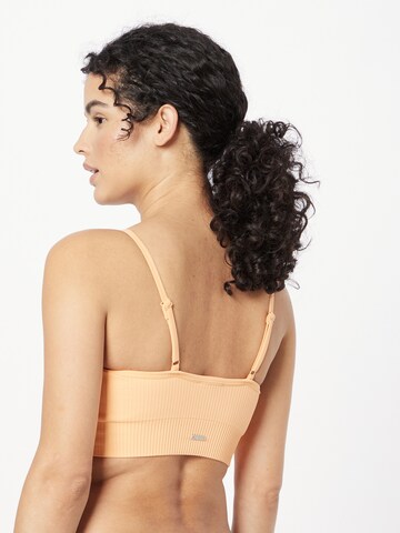 aim'n - Soutien Bustier Soutien de desporto em laranja