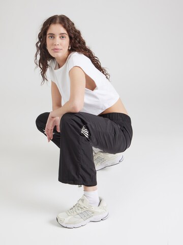 ELLESSE - Loosefit Pantalón 'CIAPPEA' en negro