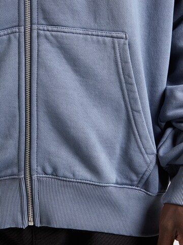 Pegador - Sudadera con cremallera en azul