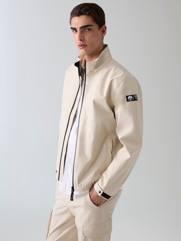 GUESS Performance Jacket in Beige: front
