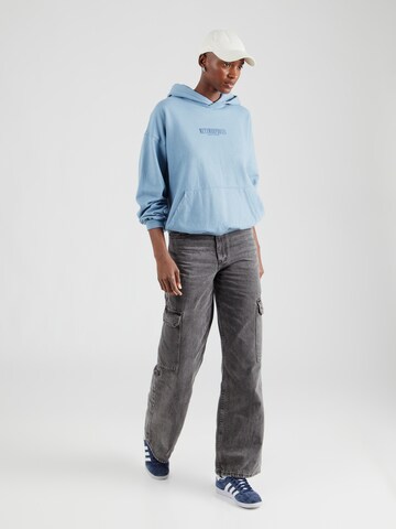 Kaotiko Sweatshirt 'METAMORPHOSIS' i blå