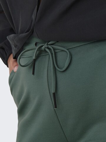 Slimfit Pantaloni 'Goldtrash Classic' di ONLY Carmakoma in verde