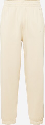 Tapered Pantaloni di Champion Authentic Athletic Apparel in beige: frontale