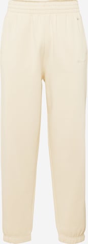 Champion Authentic Athletic Apparel Tapered Trousers in Beige: front