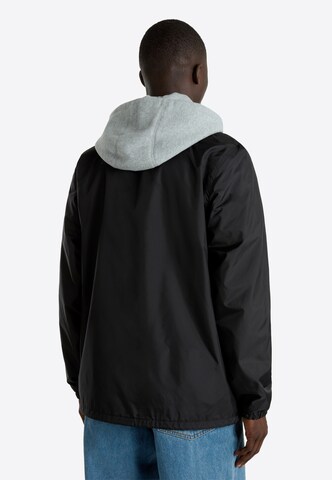 VANS Between-season jacket 'Riley II Coach' in Black
