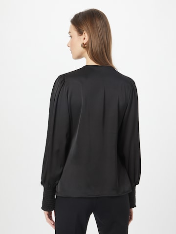 co'couture - Blusa 'Leika' en negro