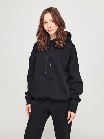 ABOUT YOU x VIAM Studio Sweatshirt 'Better' in Black: front