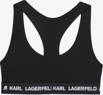 melns Karl Lagerfeld Bezvīļu Krūšturis: no priekšpuses