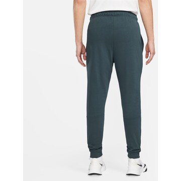 NIKE Tapered Workout Pants in Blue