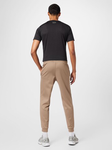 new balance Tapered Workout Pants 'Tenacity' in Beige