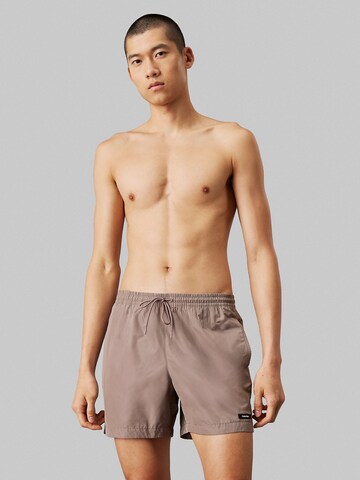 Calvin Klein Swimwear Badeshorts 'Essentials' in Braun: Vorderseite