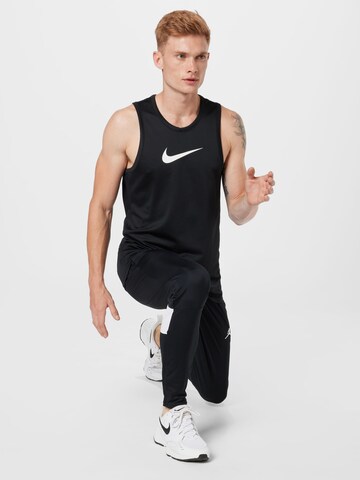 NIKE Sporttop in Schwarz