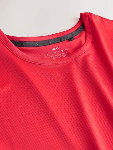 T-Shirt fonctionnel Next en rouge