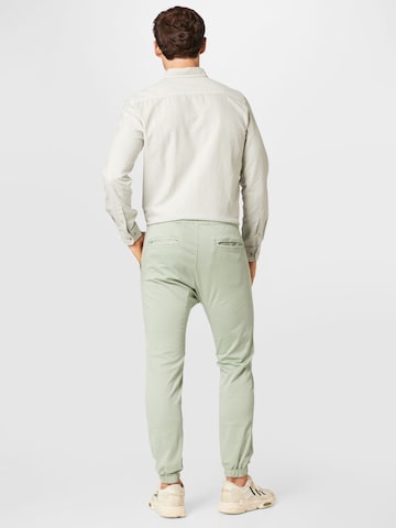Effilé Pantalon 'Drake' Cotton On en vert