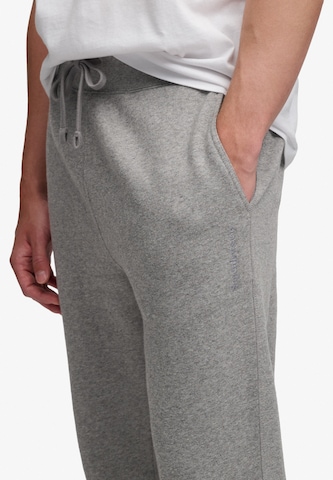 Superdry & Co Zúžený Kalhoty 'ESSENTIAL' – šedá