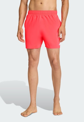 ADIDAS SPORTSWEAR Board Shorts in Red: front
