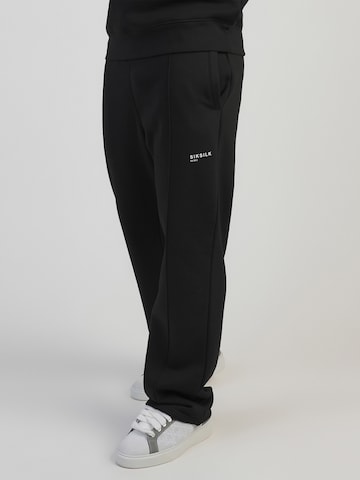 Baggy Pantalon de sport SikSilk en noir : devant