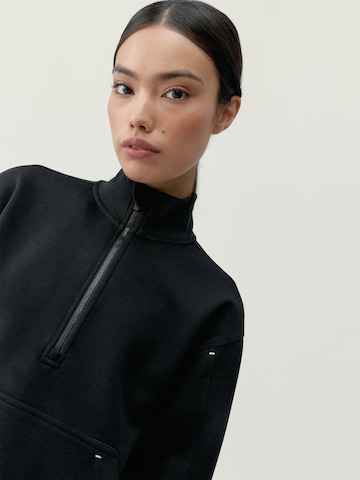 Born Sportief sweatshirt ' Bloom ' in Zwart