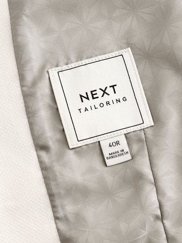 Next - Colete de fato em bege