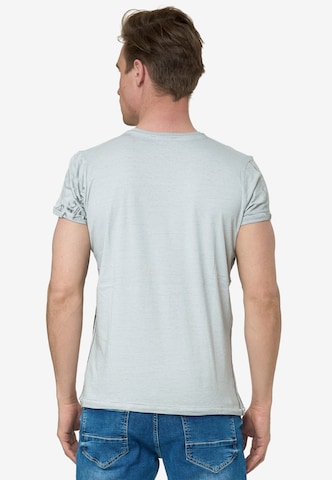 Rusty Neal Cooles T-Shirt mit Knopfleiste in Beige