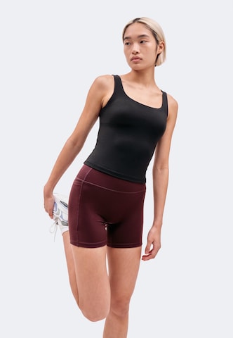 ICANIWILL - Skinny Pantalón deportivo en rojo: lado