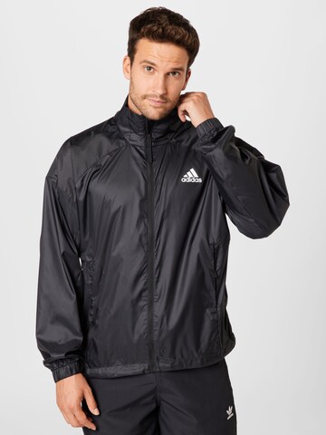 ADIDAS SPORTSWEAR - Casaco deportivo 'TRAVEER' em preto: frente