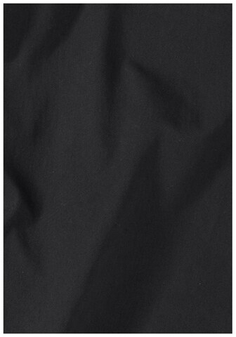JACK WOLFSKIN Loose fit Outdoor Pants in Black