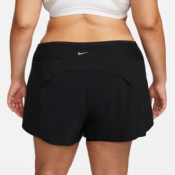 NIKE Regular Workout Pants in Black