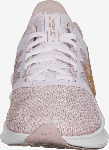 Chaussure de course 'Downshifter 11' NIKE en rose