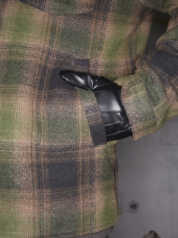 ABOUT YOU x Rewinside Between-season jacket 'Adrian' in Green