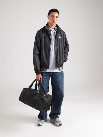 Nike Sportswear Koszulka 'Premium Essentials' w kolorze niebieski