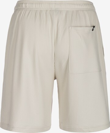 UNDER ARMOUR Loosefit Sporthose in Beige