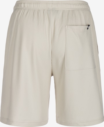 UNDER ARMOUR Loose fit Workout Pants in Beige