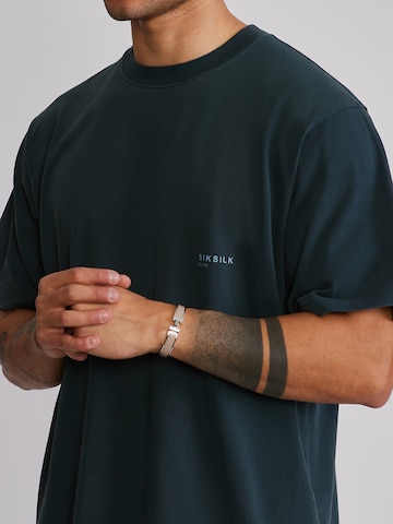 Maglietta di SikSilk in verde