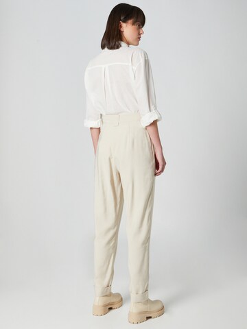 Guido Maria Kretschmer Women Regular Trousers with creases 'Maike' in Beige